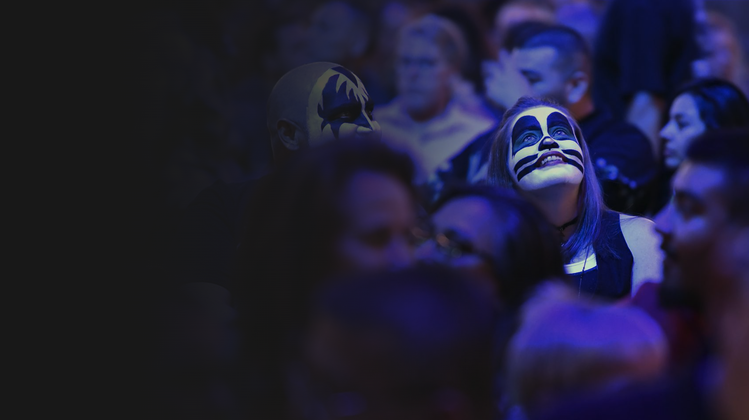Kiss fans in face paint at a show